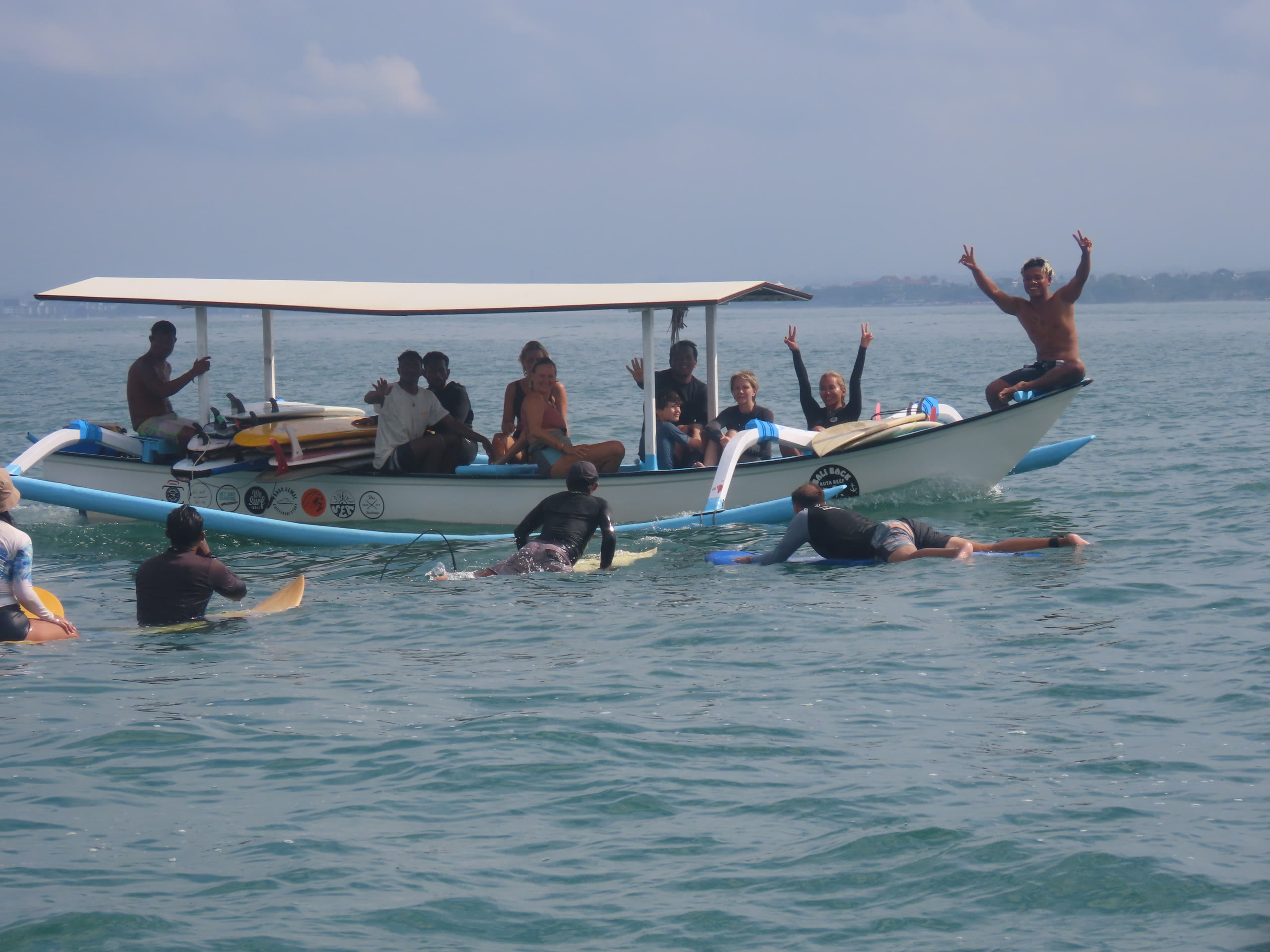 Bali Kami instructors on the beach at Kuta Reef